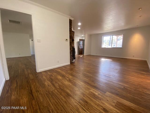 1956 Meadowbrook Road Prescott, AZ 86303 - Photo 4 of 11 an empty room with wooden floor and windows