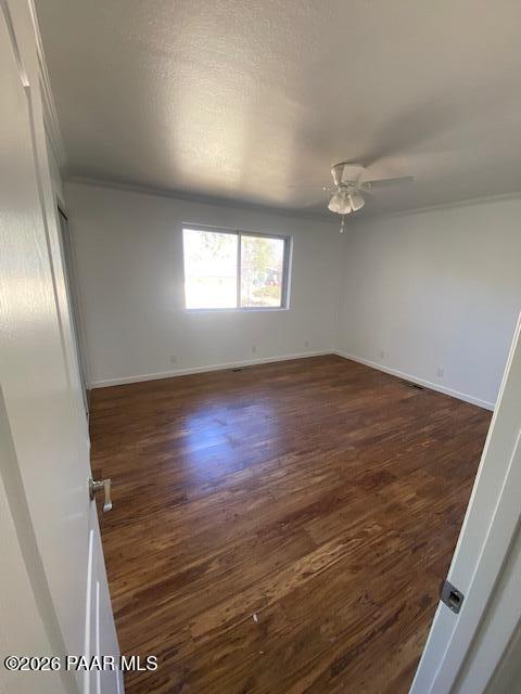 1956 Meadowbrook Road Prescott, AZ 86303 - Photo 5 of 11 wooden floor in an empty room with a window