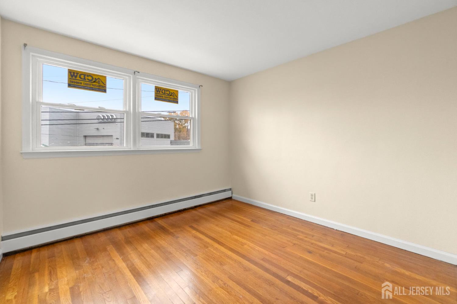 762 Valley Street Maplewood, NJ 07040 - Photo 16 of 21 a view of an empty room with a window