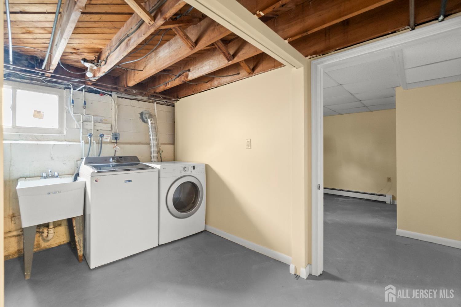 762 Valley Street Maplewood, NJ 07040 - Photo 18 of 21 a utility room with dryer and washer