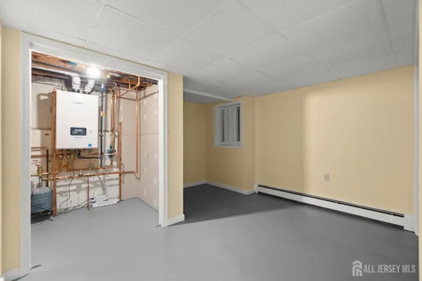 a bathroom with a sink a mirror and a shower