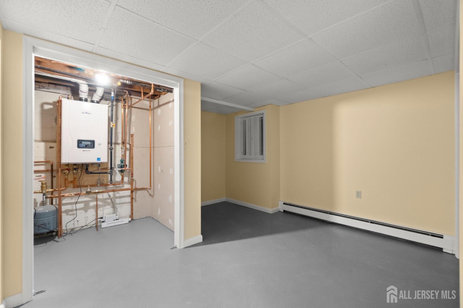 762 Valley Street Maplewood, NJ 07040 - Photo 19 of 21 a view of an empty room with a fireplace