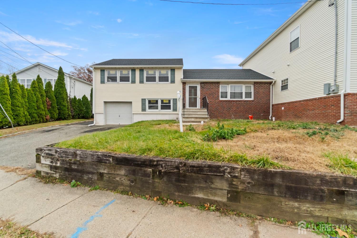 762 Valley Street Maplewood, NJ 07040 - Photo 2 of 21 a front view of a house with a yard