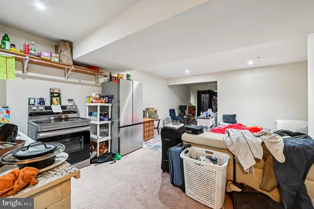 a view of a workspace with furniture