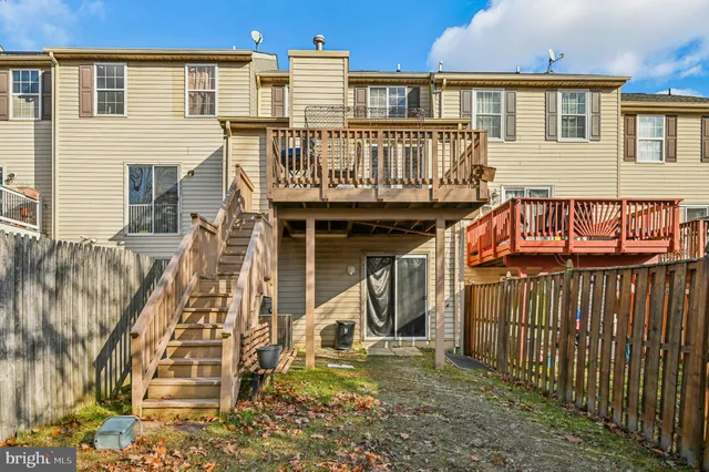 a view of a house with iron stairs
