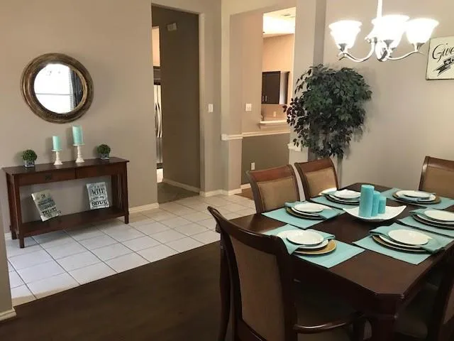 a view of a dining room with furniture