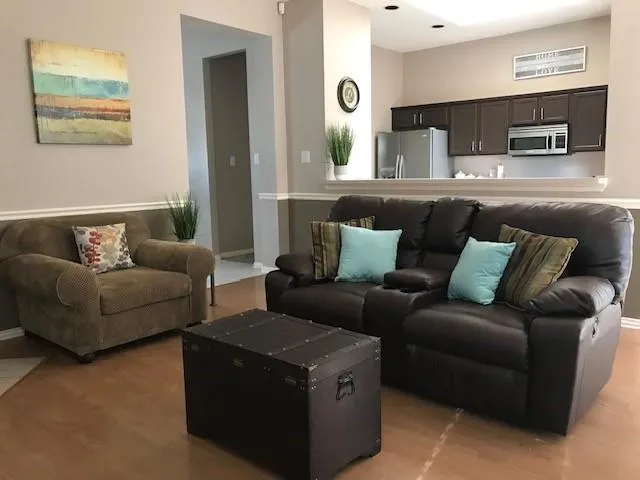 a living room with furniture and a couch