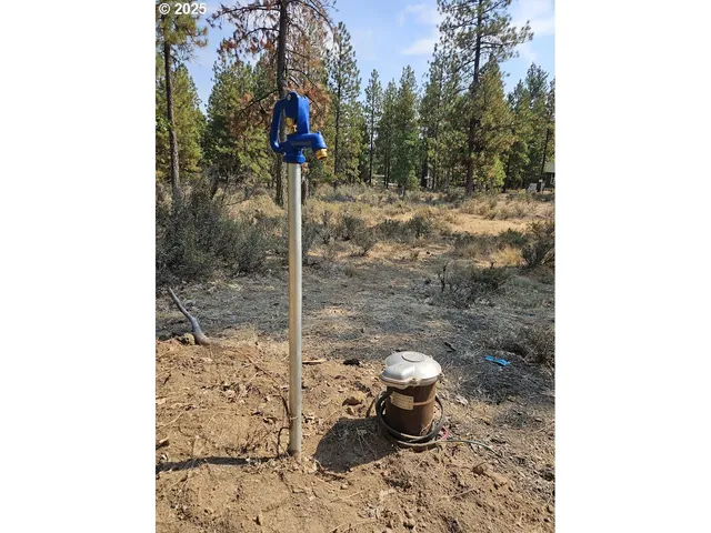a table and chairs in front of a door