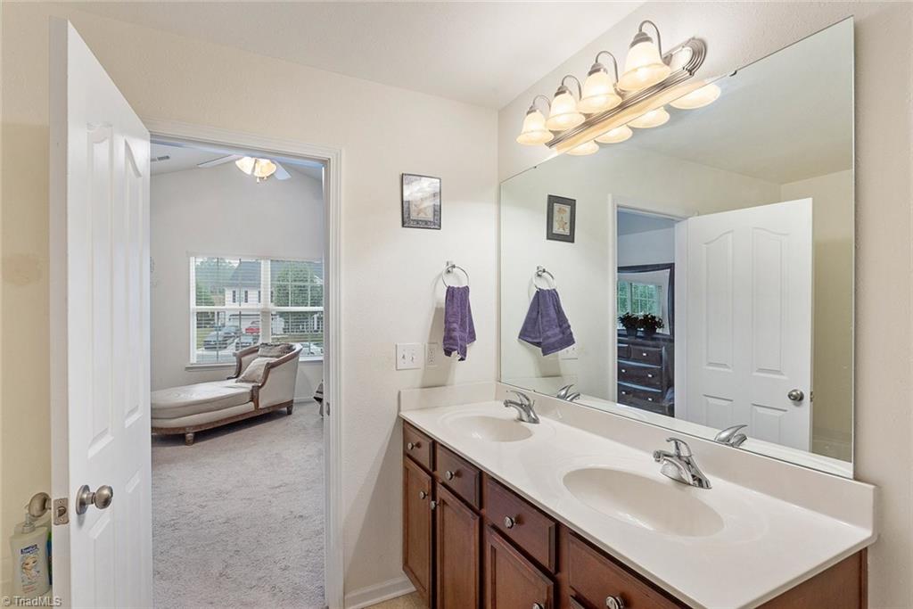 1347 Sharp Ridge Road Greensboro, NC 27406 - Photo 9 of 17 Master bathroom with walk-in shower and garden tub
