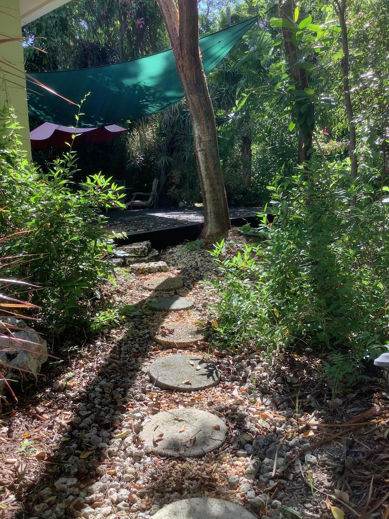 809 Largo Road Key Largo, FL 33037 - Photo 24 of 29 Backyard Walkway