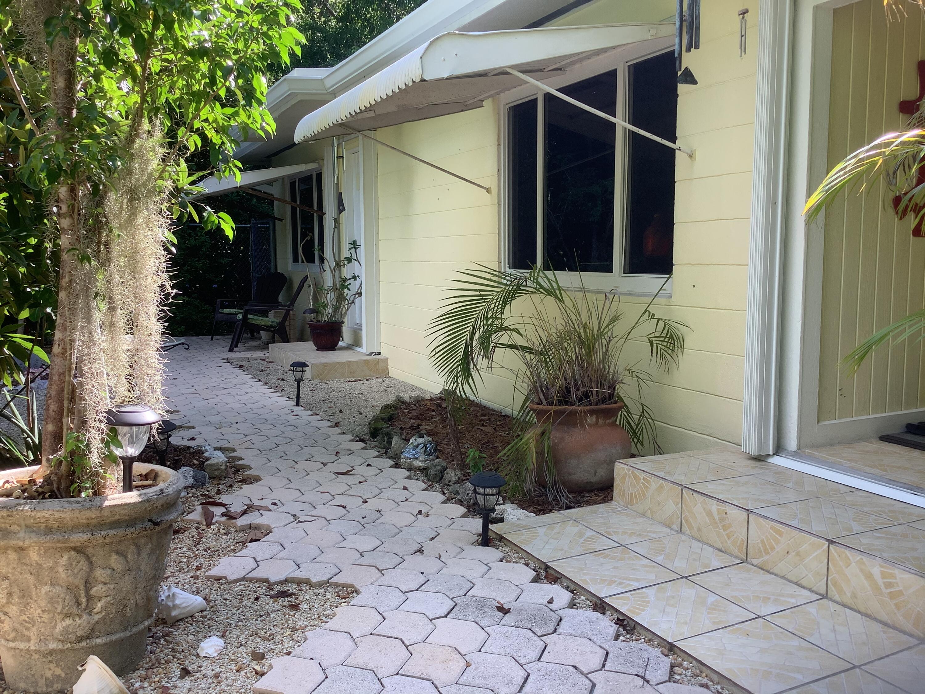 809 Largo Road Key Largo, FL 33037 - Photo 27 of 29 Impact Windows in the front
