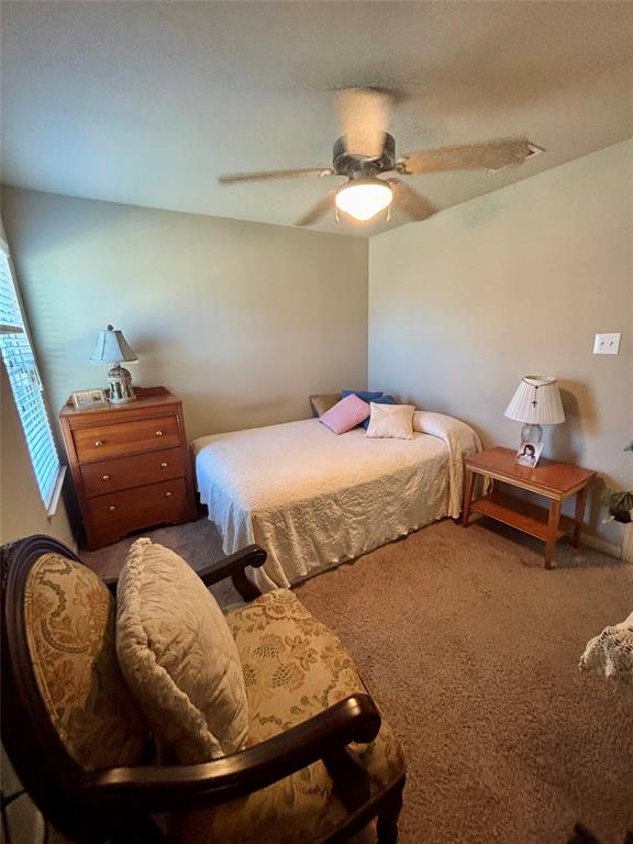 10717 Fallbrook Road Waco, TX 76708 - Photo 24 of 33 a bedroom with two beds and painted walls