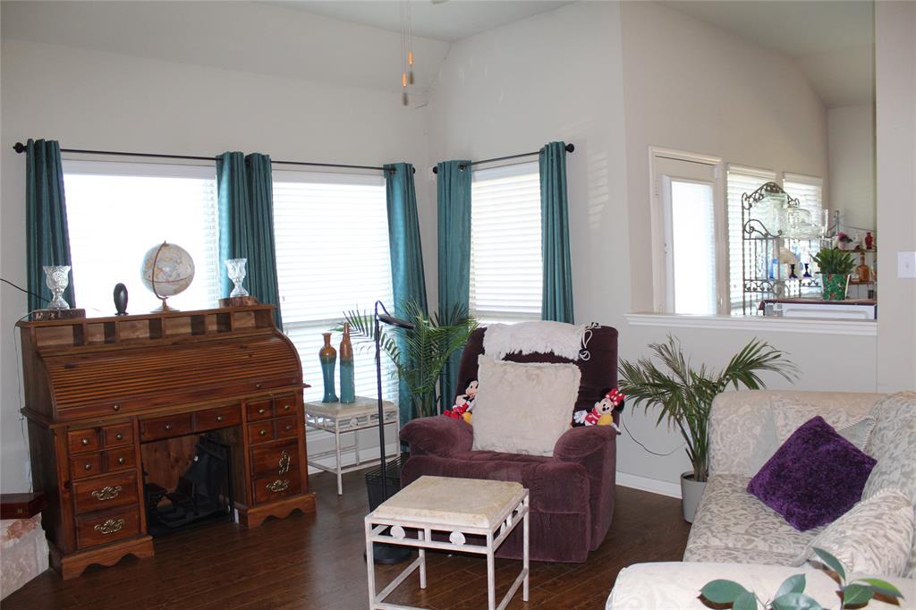 10717 Fallbrook Road Waco, TX 76708 - Photo 6 of 33 a living room with furniture and wooden floor