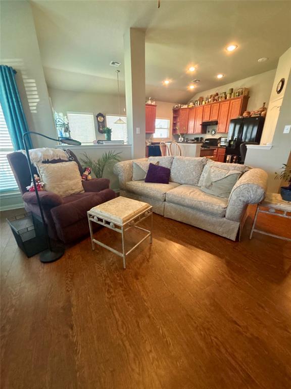 10717 Fallbrook Road Waco, TX 76708 - Photo 9 of 33 a living room with furniture and a view of kitchen