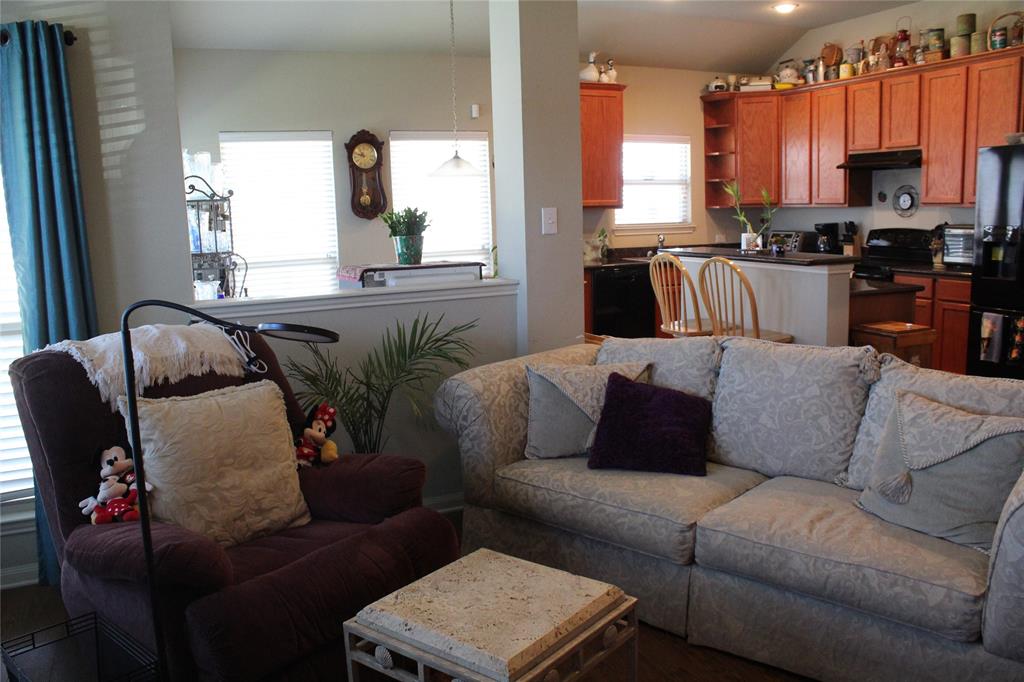 10717 Fallbrook Road Waco, TX 76708 - Photo 10 of 33 a living room with furniture and a large window