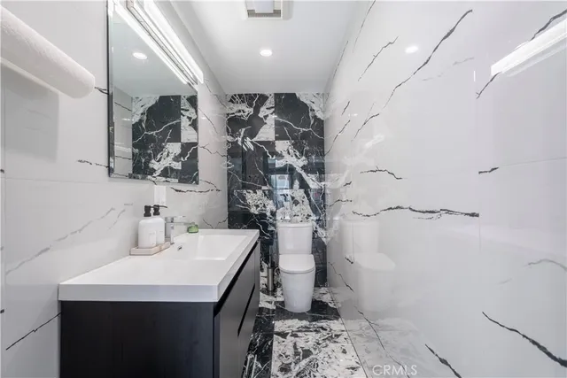 a view of a tables and chairs in a patio