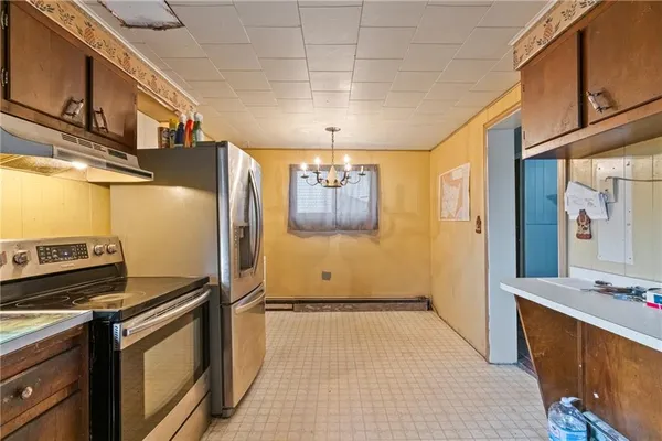 a view of a kitchen with a sink
