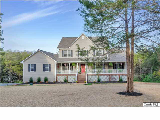 686 Valley View Road Ruckersville, VA 22968 - Photo 1 of 33 a front view of a house with a garden