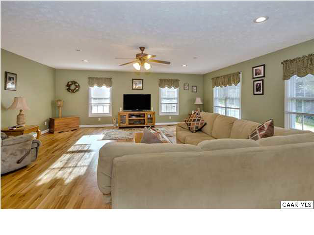 686 Valley View Road Ruckersville, VA 22968 - Photo 12 of 33 a living room with furniture and a flat screen tv