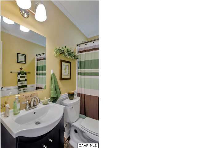 686 Valley View Road Ruckersville, VA 22968 - Photo 20 of 33 a bathroom with a sink and mirror