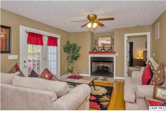 686 Valley View Road Ruckersville, VA 22968 - Photo 22 of 33 a living room with furniture and a fireplace