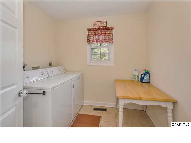 686 Valley View Road Ruckersville, VA 22968 - Photo 29 of 33 a utility room with dryer and washer