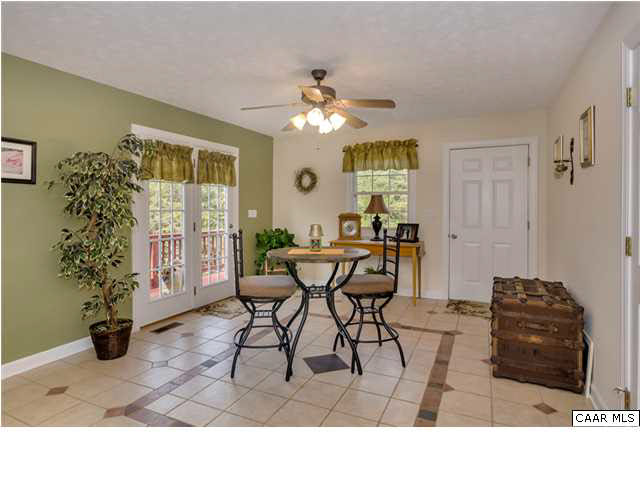 686 Valley View Road Ruckersville, VA 22968 - Photo 10 of 33 a living room with furniture and a large window