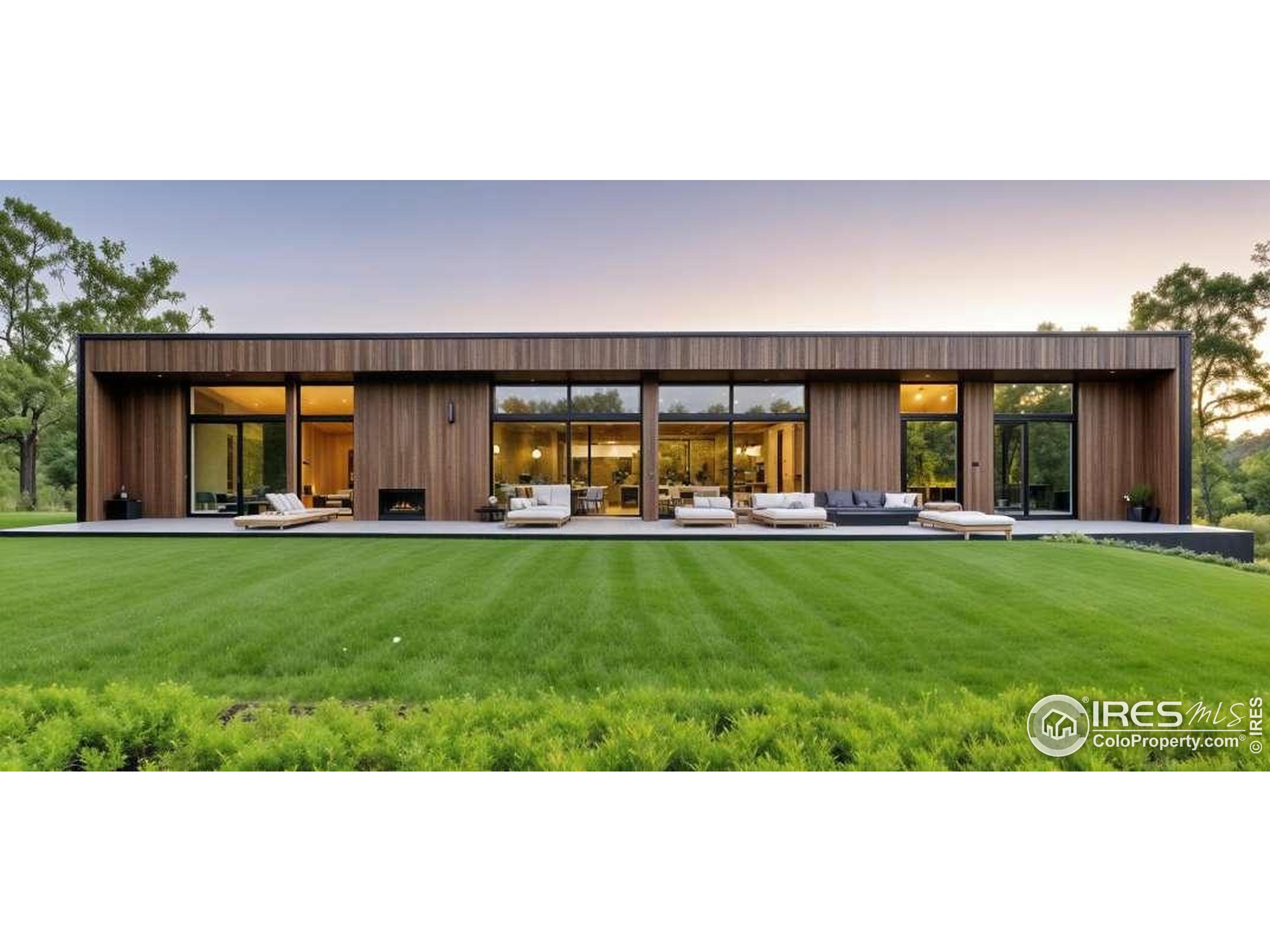 Undisclosed Address Loveland, CO 80537 - Photo 1 of 8 a view of an house with a big yard and potted plants