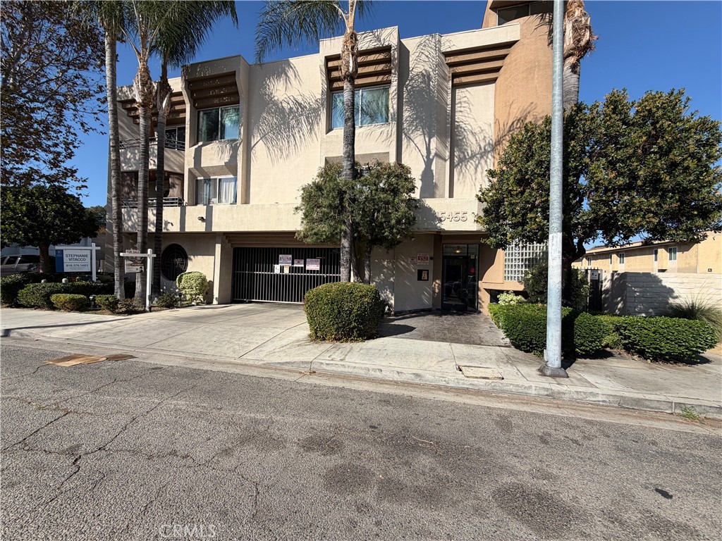 15455 Sherman Way, Unit 11 Van Nuys, CA 91406 - Photo 1 of 11 a front view of a building with street