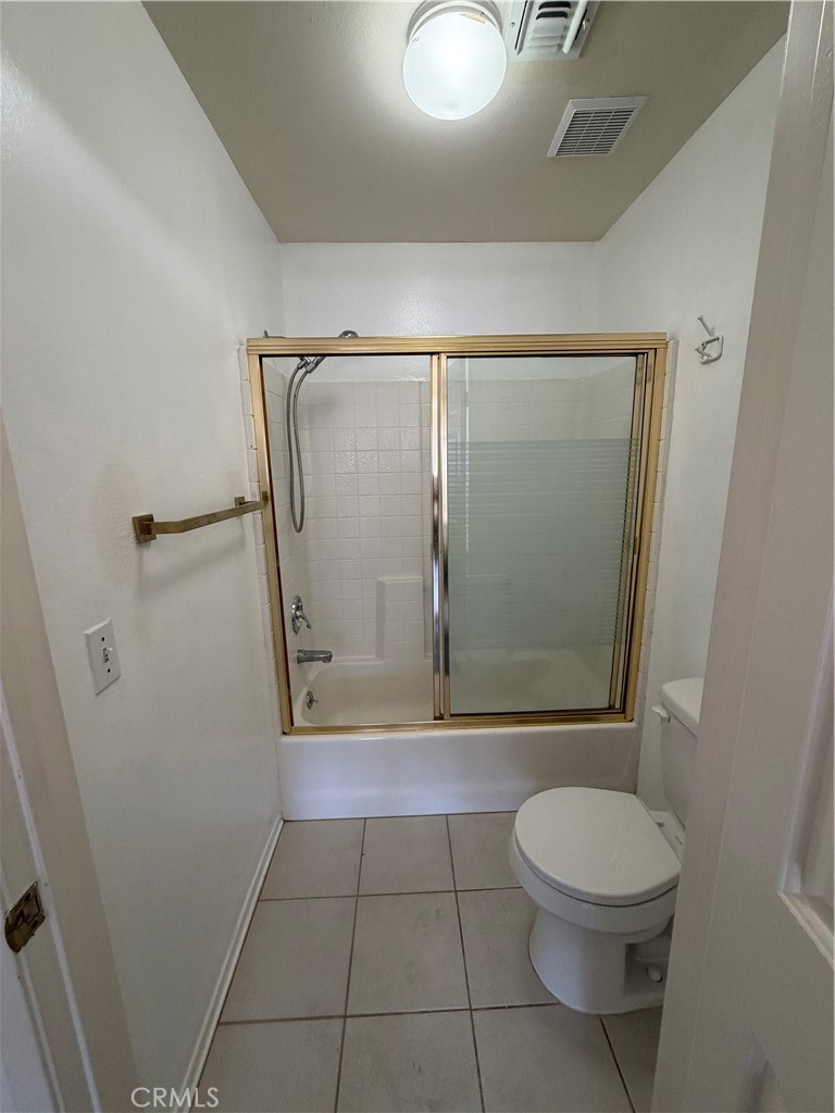15455 Sherman Way, Unit 11 Van Nuys, CA 91406 - Photo 6 of 11 a bathroom with a toilet and a shower