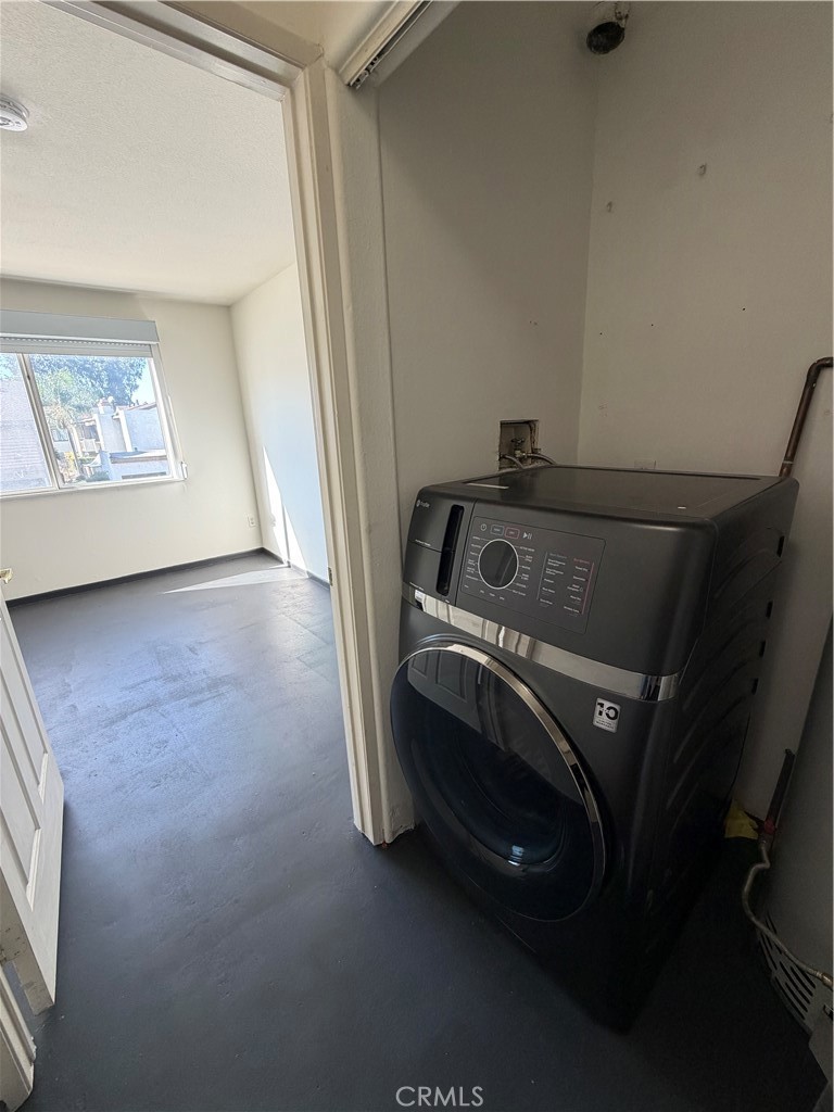 15455 Sherman Way, Unit 11 Van Nuys, CA 91406 - Photo 7 of 11 a utility room with dryer and washer