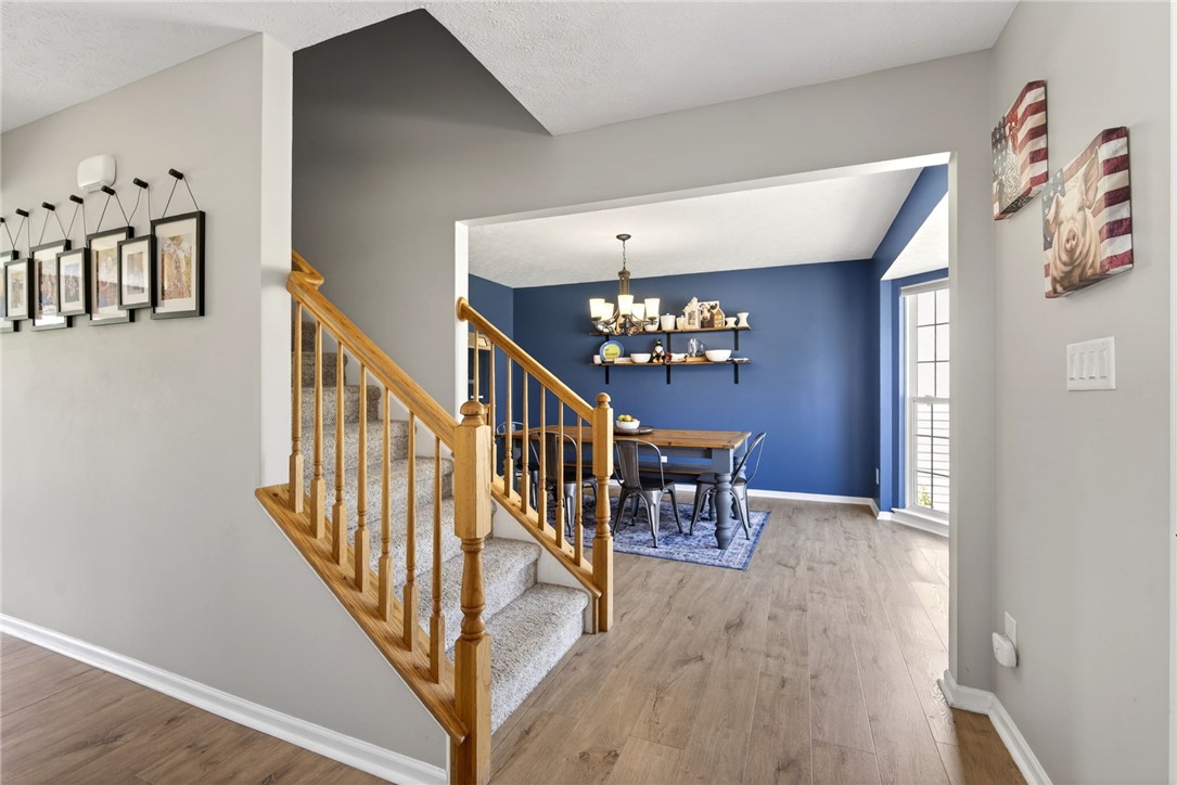 39 Holly Court Springboro, OH 45066 - Photo 6 of 42 This interior offers a seamless transition between levels and an inviting dining area.