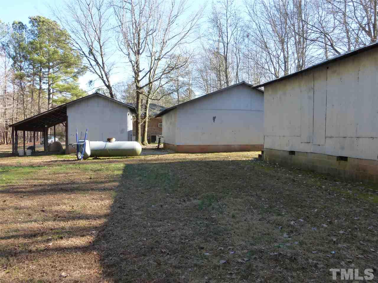 2314 Carpenter Pond Road Raleigh, NC 27613 - Photo 6 of 12 a backyard of a house