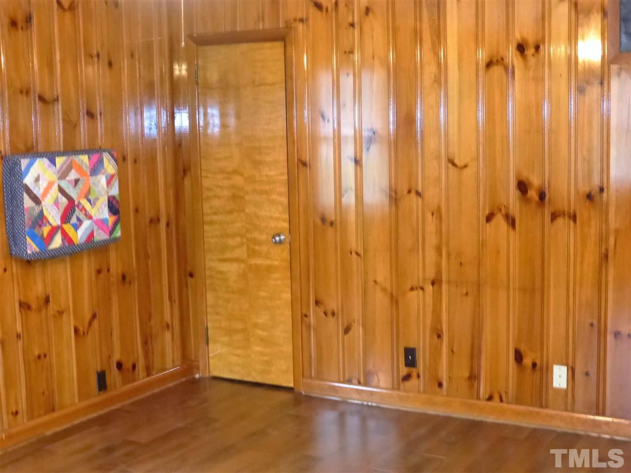 2314 Carpenter Pond Road Raleigh, NC 27613 - Photo 10 of 12 a view of wooden door