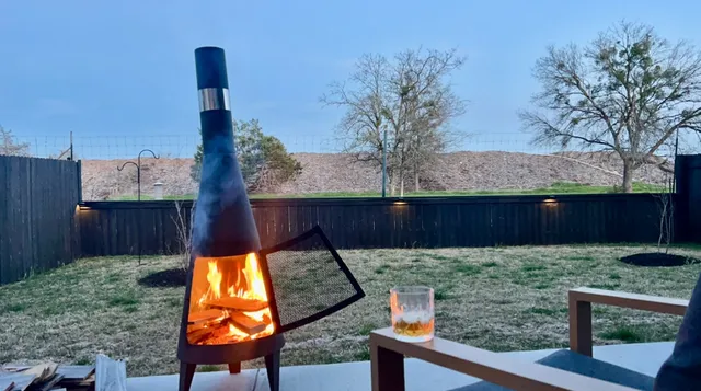 a view of a wooden deck with a bench