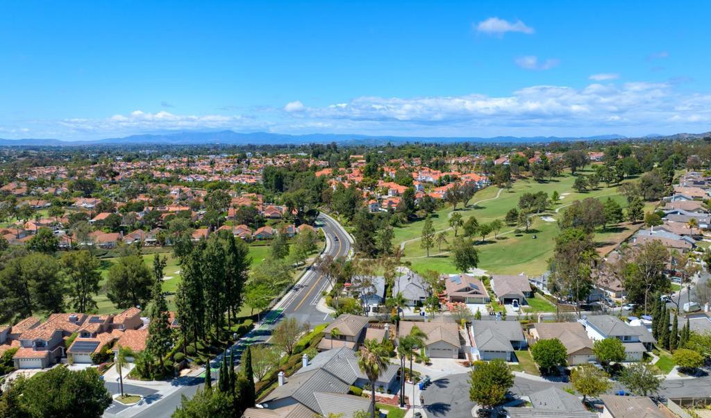 1394 Longfellow Road Vista, CA 92081 - Photo 45 of 50 an aerial view of a city with lots of residential buildings ocean and mountain view in back