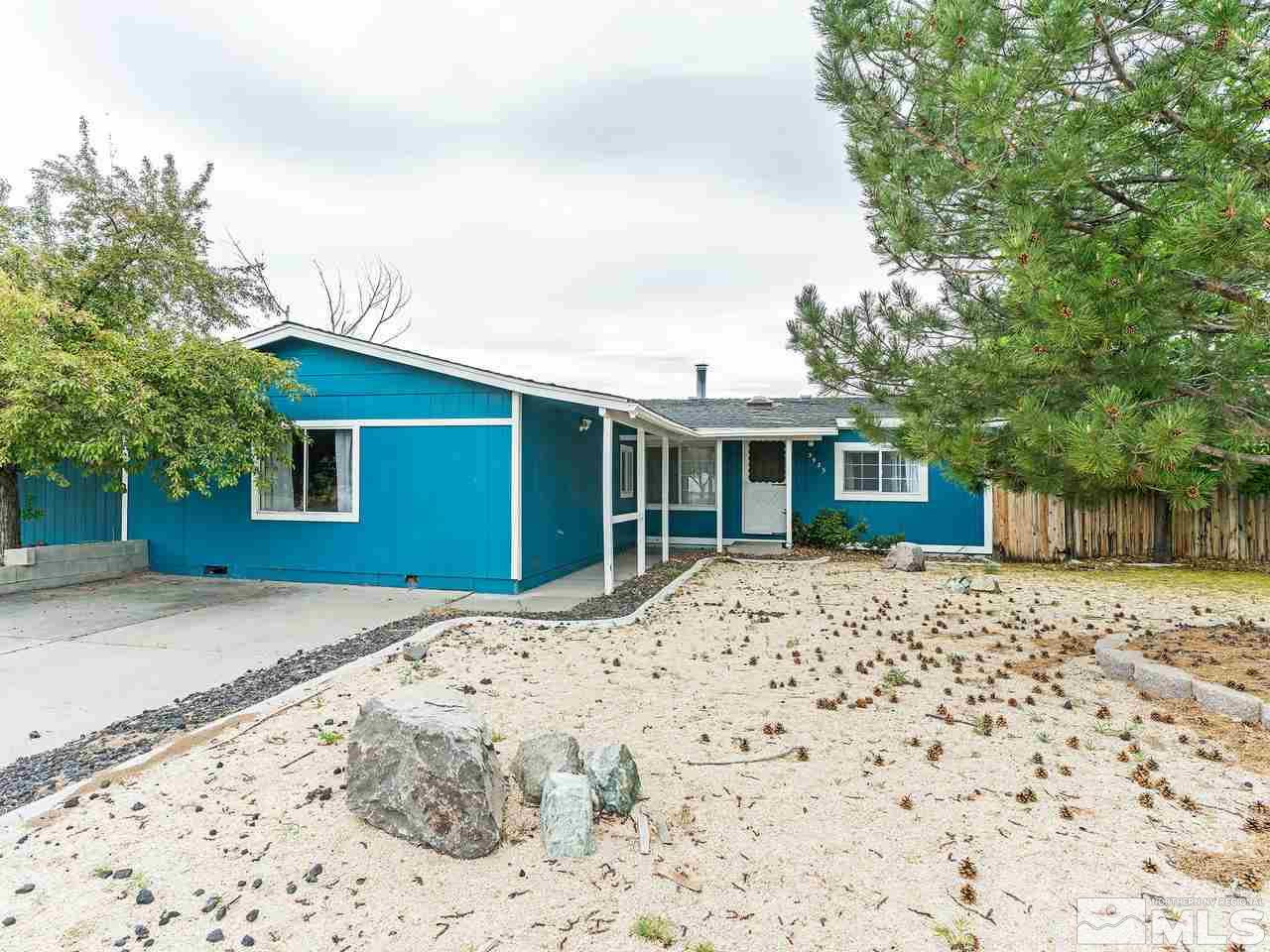 3935 Brant Street Reno, NV 89508 - Photo 2 of 15 a front view of a house with a yard