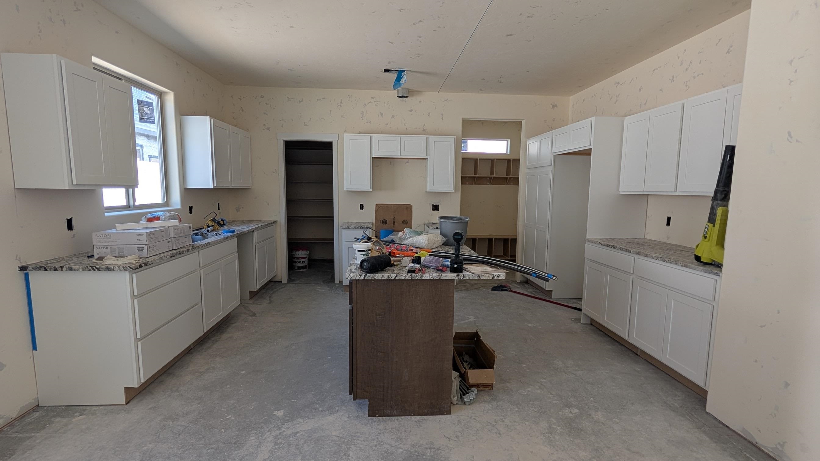 2456 Hamilton Road, Unit A Grand Junction, CO 81505 - Photo 2 of 13 a kitchen with sink cabinets and window