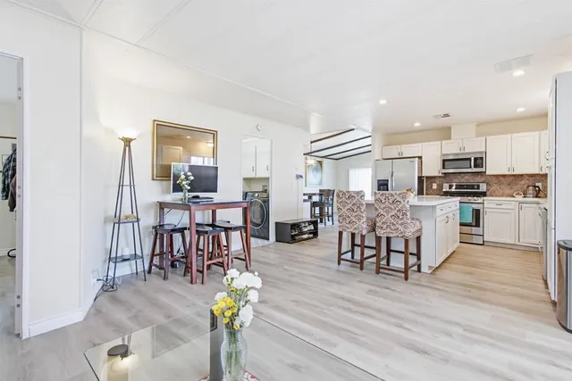 a bathroom with a shower a toilet and a sink