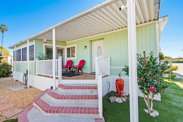 a view of a porch with furniture