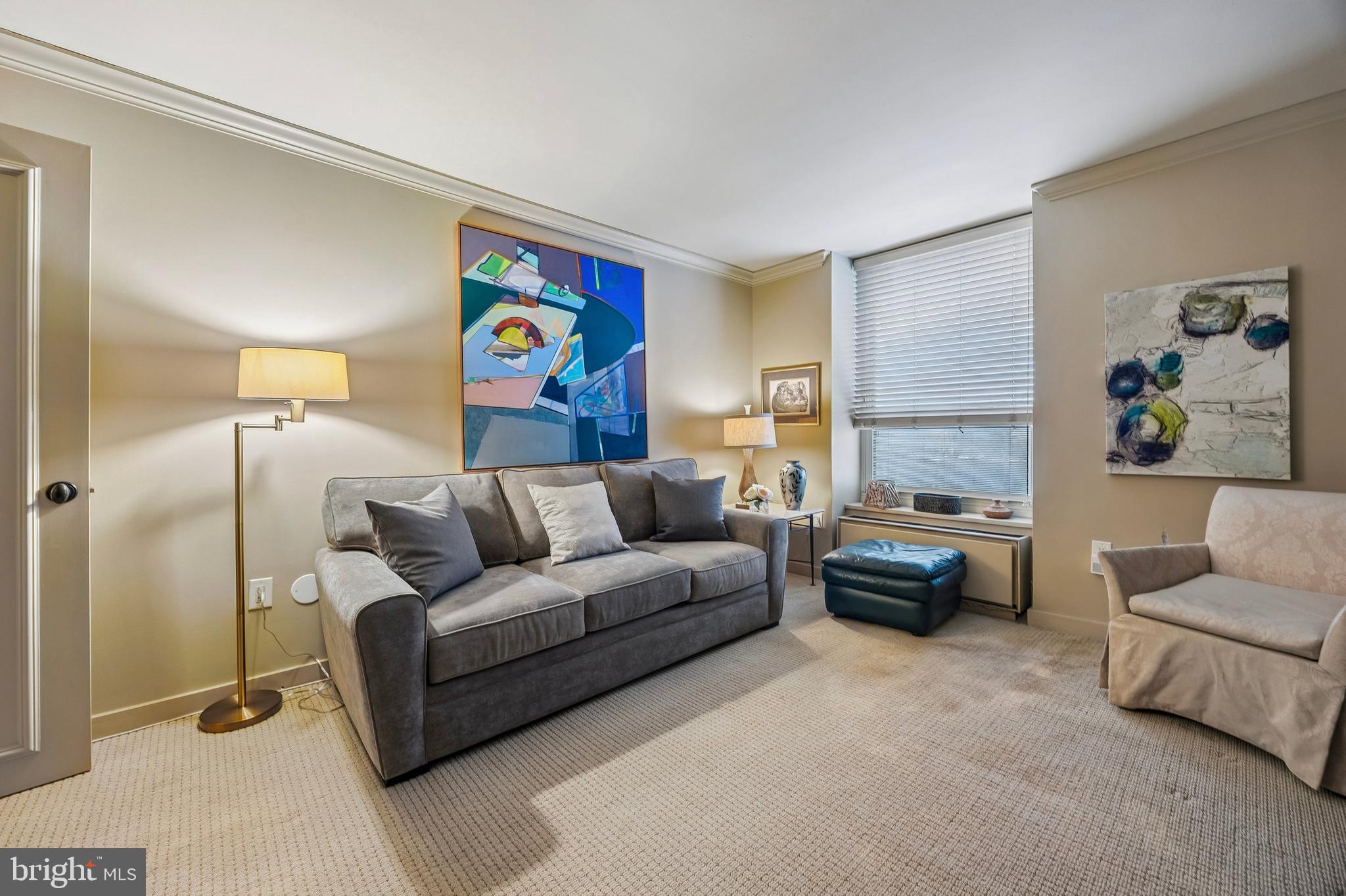 41 Conshohocken State Road, Unit 603 Bala Cynwyd, PA 19004 - Photo 13 of 37 a living room with furniture and a couch