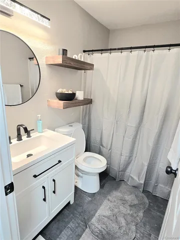 a bedroom with a bed and a walk in closet