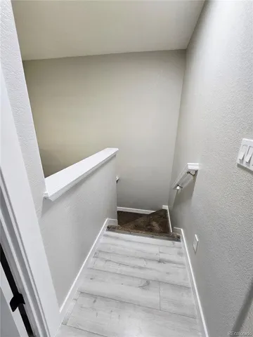 a view of a living room with furniture