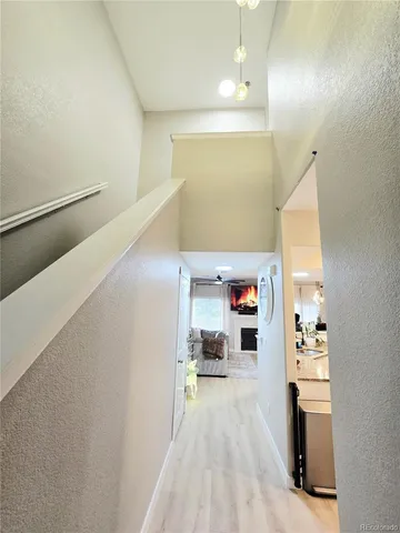 a view of a deck with furniture