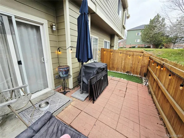 a balcony with a yard
