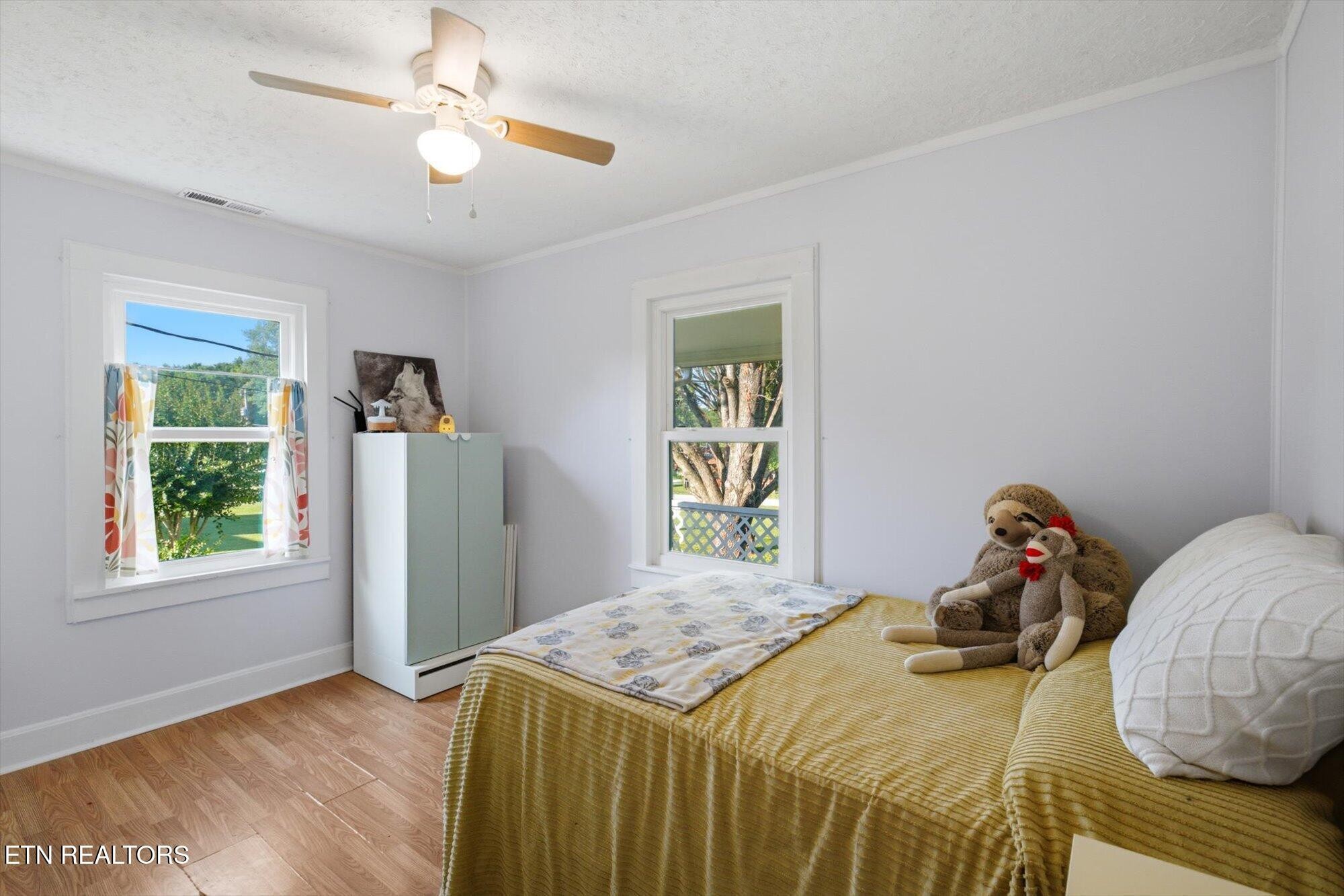 159 Mill Street Delano, TN 37325 - Photo 15 of 22 a bedroom with a bed and a window