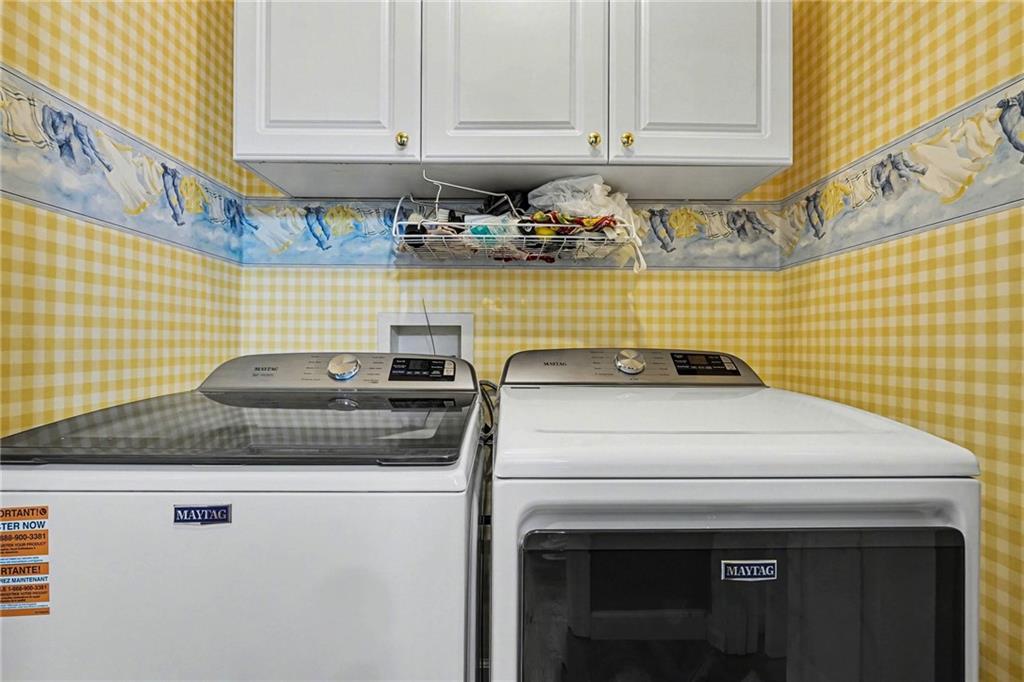 526 Antioch Church Road Talking Rock, GA 30175 - Photo 14 of 38 a utility room with dryer and washer