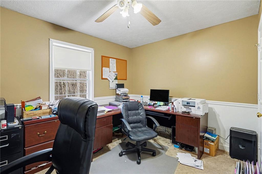 526 Antioch Church Road Talking Rock, GA 30175 - Photo 16 of 38 a view of a workspace with furniture and a window