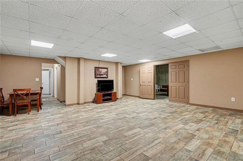 526 Antioch Church Road Talking Rock, GA 30175 - Photo 27 of 38 a view of a livingroom with furniture and an empty room