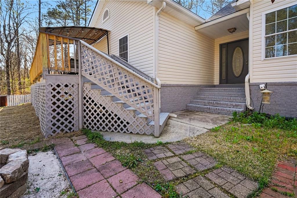 526 Antioch Church Road Talking Rock, GA 30175 - Photo 3 of 38 a view of a wooden door with a bench